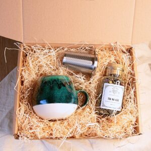 Geschenkset mit Tasse, Teesieb und Kräutertee